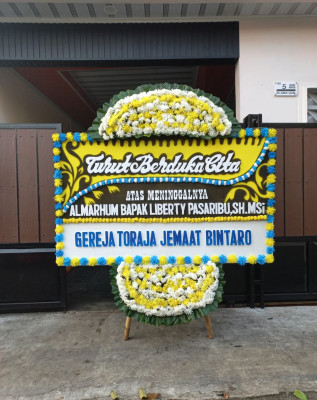 Papan Bunga Duka di Wonoasri